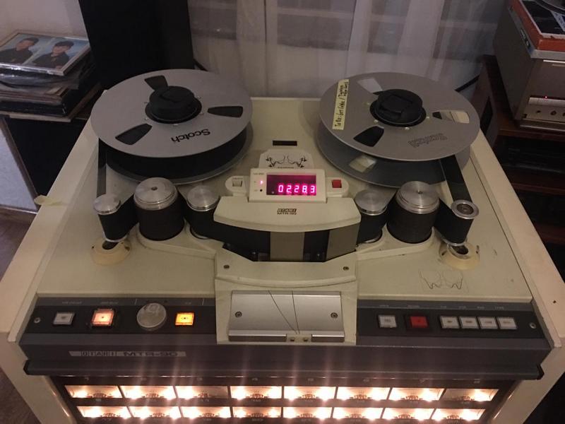Old fashioned wooden reel to reel tape machine for recording sound